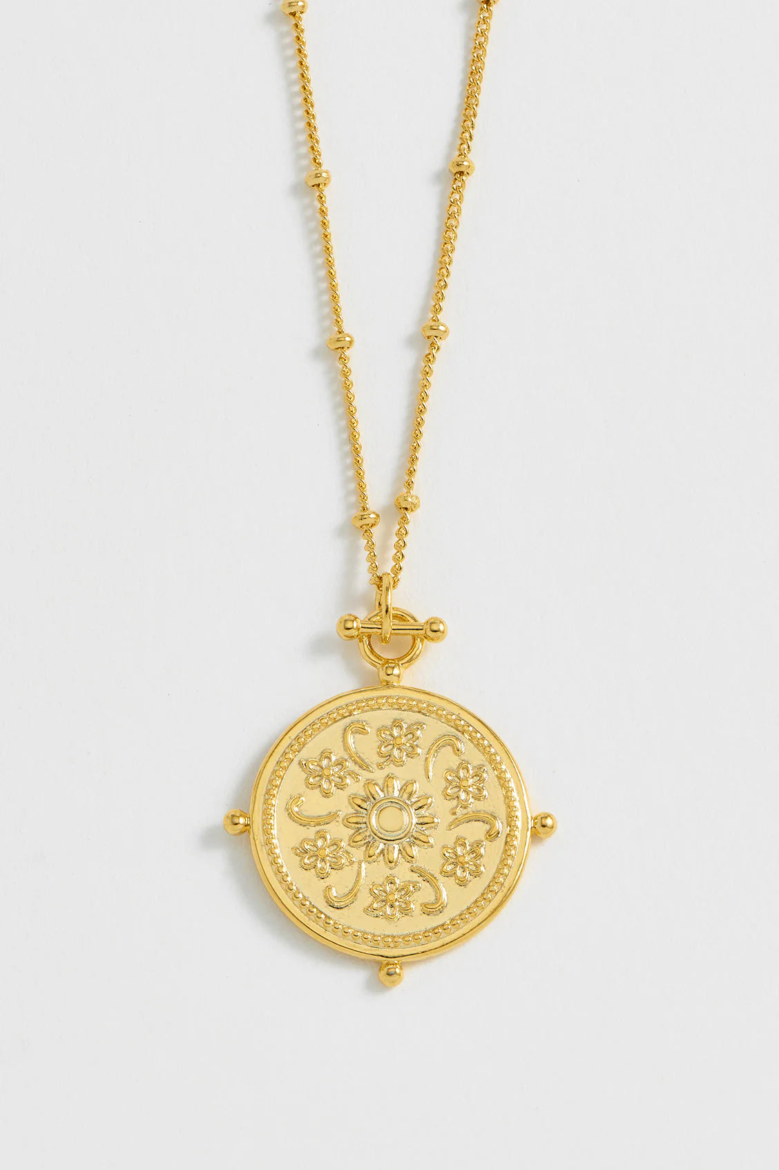 Floral coin necklace | Estella Bartlett
