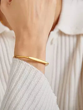 Signet gold bangle | Katie Loxton