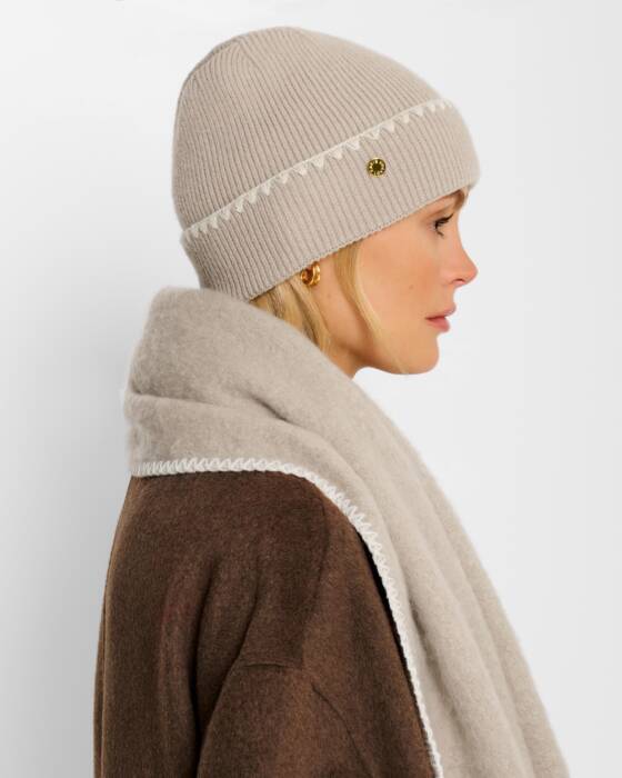 Whipstitch knitted taupe hat | Katie Loxton